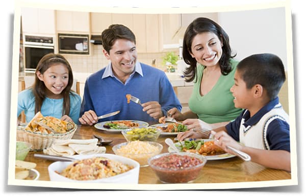 family-enjoying-mealmealtime-together