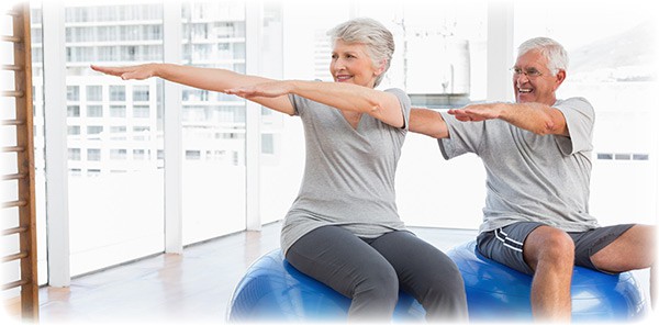 senior-couple-doing-stretching-exercises