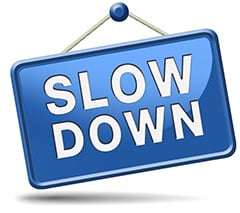 slowdown-blue-placard