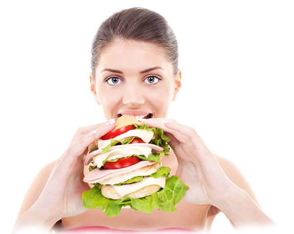 young-woman-eating-a-huge-sandwich