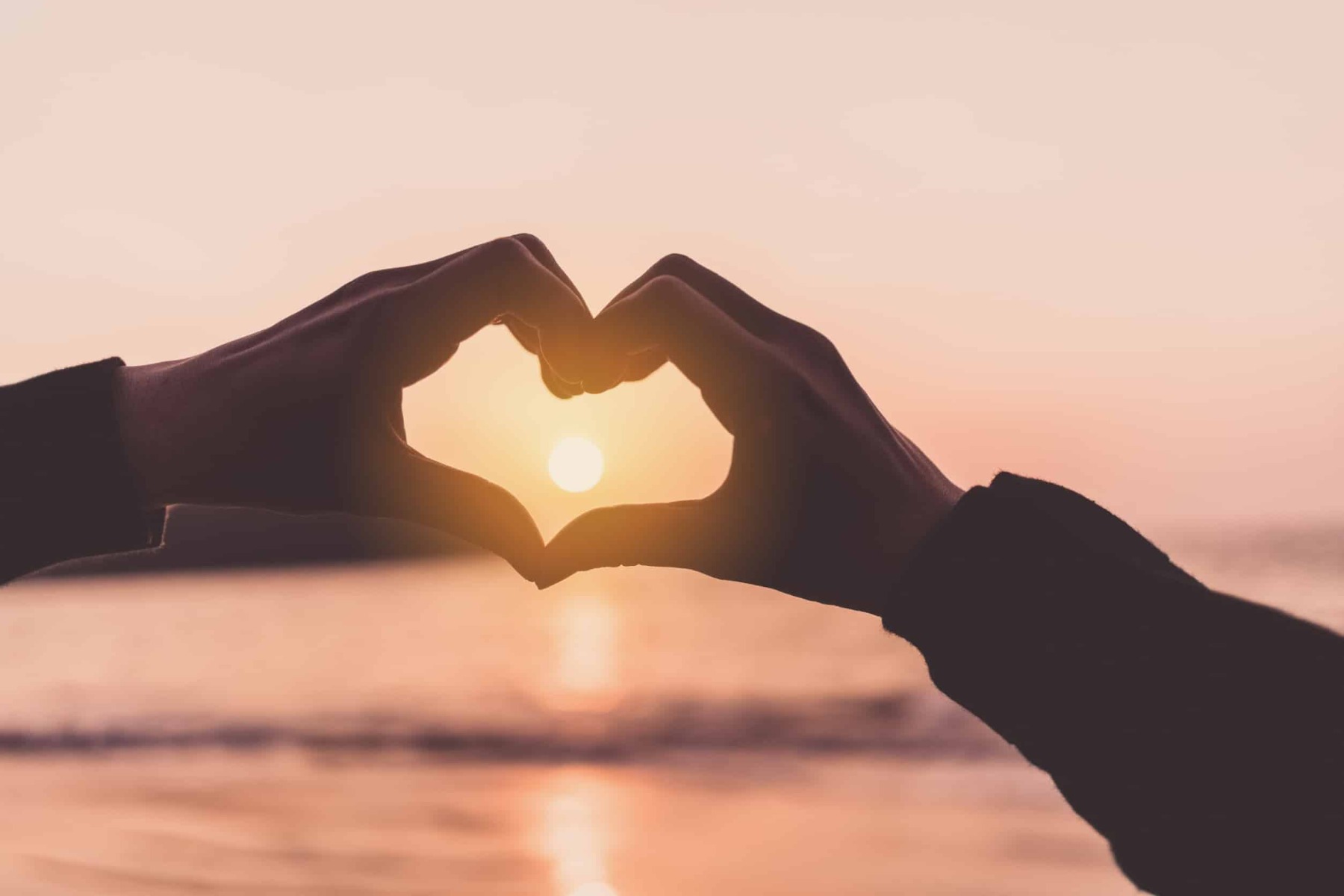 Woman's hand shaped to heart