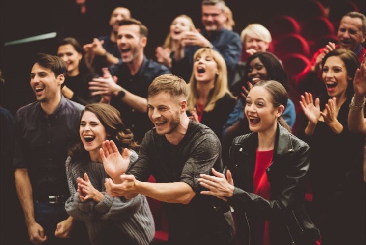 happy and cheering audience
