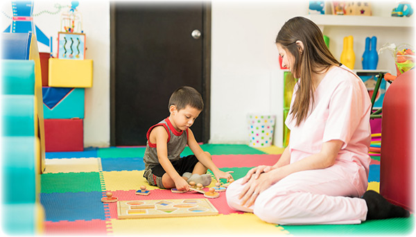 boy-playing-in-a-therapy-center-49144497 