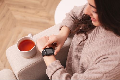 A girl checking her smart watch
