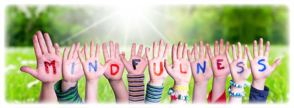 children-hands-building-word-mindfulness-80900514
