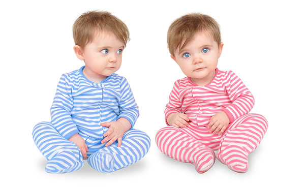 curious-twin-babies-on-white-11708342