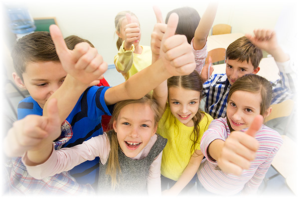 group-of-school-kids-showing-thumbs-up-23588702