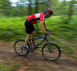 mountain-biker-with-blurred-background-2132515