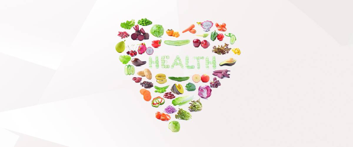 An image of vegetables and fruits in a heart shape