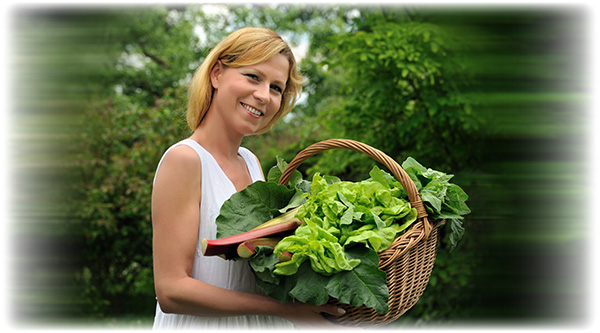 young-woman-holding-basket-with-2983116